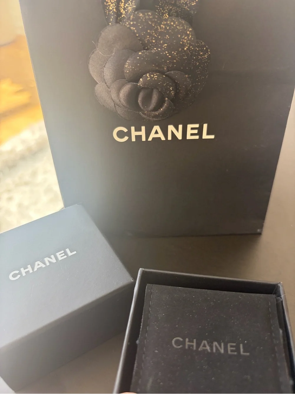 CHANEL ring showcasing